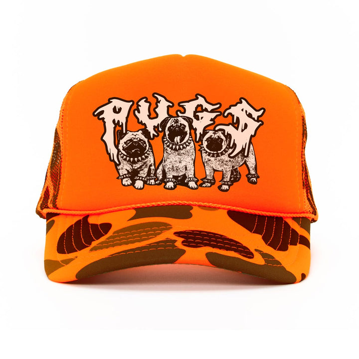 Orange and camouflage trucker hat with dog graphic on a white background
