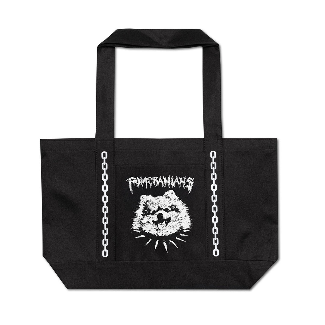 A black canvas tote bag with white printed graphics, featuring the band name 'Pomeranian' in a jagged font above a stylized dog head and chain-link illustrations running down the sides.