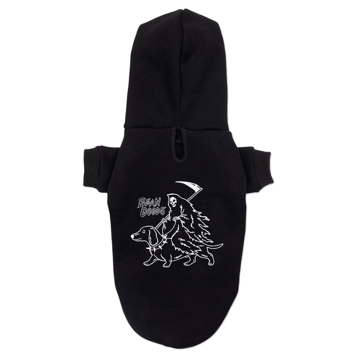 A black pet hoodie with a white graphic of a grim reaper riding a dachshund, featuring ribbed cuffs, shown on a plain white background.