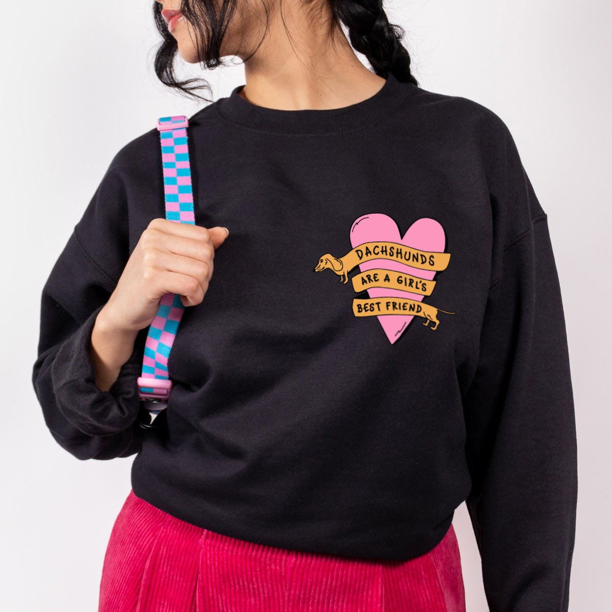 dachshunds are a girl’s best friend unisex crew sweatshirt | black - bean goods